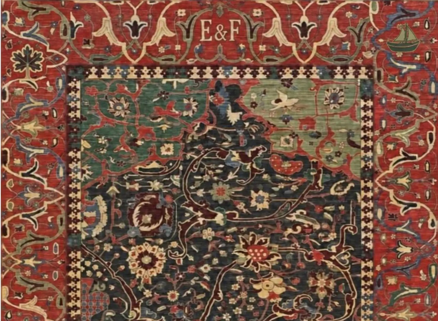 The same carpet with a fig tree, a green sailing boat and the initials E&F woven into the border